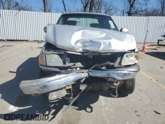 2003 Ford F-150 XLT with VIN 1FTRW08L03KD74119, listed as a Copart auction lot 47373105 with 303,513 mi miles and Salvage Title. Bid and sale history available at carsss.com. Image 5.