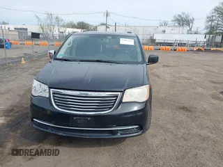 2014 Chrysler Town & Country Touring-L with VIN 2C4RC1CG2ER214952, listed as a IAAI auction lot 42083166 with 188,494 mi miles. Bid and sale history available at carsss.com. Image 6.