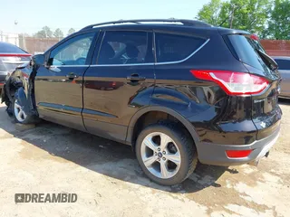 2013 Ford Escape SE with VIN 1FMCU0GX5DUD04780, listed as a IAAI auction lot 41990300 with 91,193 mi miles and . Bid and sale history available at DreamBid. Image 3.