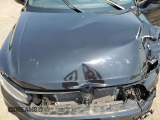 2023 Volkswagen Tiguan SE R-Line Black with VIN 3VV8B7AX3PM141106, listed as a Copart auction lot 62381835 with 18,153 mi miles and Salvage title. Bid and sale history available at DreamBid. Image 12.
