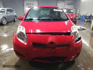 2011 Toyota Yaris with VIN JTDKT4K31B5333148, listed as a Copart auction lot 45413015 with 97,450 mi miles and Salvage Title. Bid and sale history available at carsss.com. Image 5.