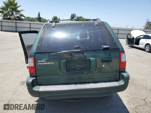 2000 Isuzu Rodeo S with VIN 4S2CK58W2Y4324928, listed as a Copart auction lot 59800375 with Not provided miles and Salvage title. Bid and sale history available at DreamBid. Image 6.