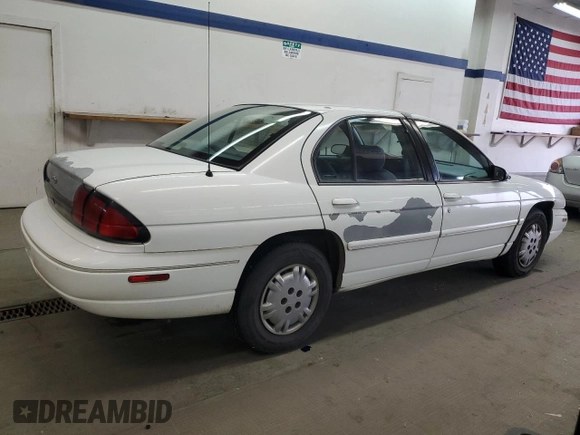 1996 Chevrolet Lumina LS with VIN 2G1WL52MXT1153999, listed as a Copart auction lot 81385634 with 176,573 mi miles and Salvage Title. Bid and sale history available at DreamBid. Image 3.