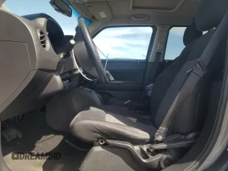 2011 Jeep Patriot Sport with VIN 1J4NF1GBXBD279089, listed as a Copart auction lot 53934335 with 127,928 mi miles and Salvage Title. Bid and sale history available at carsss.com. Image 7.