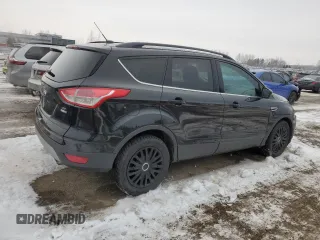 2014 Ford Escape SE with VIN 1FMCU9GX8EUC86958, listed as a Copart auction lot 42552605 with 258,691 mi miles and Salvage Title. Bid and sale history available at carsss.com. Image 3.
