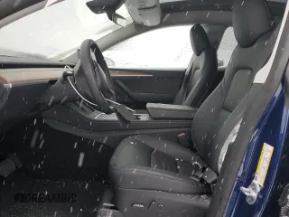 2024 Tesla Model Y Long Range with VIN 7SAYGAEE0RF184074, listed as a Copart auction lot 44333645 with 11,403 mi miles and Salvage Title. Bid and sale history available at DreamBid. Image 7.