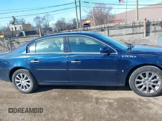 2009 Buick Lucerne CXL with VIN 1G4HD57M09U135641, listed as a IAAI auction lot 41823615 with 107,479 mi miles and . Bid and sale history available at DreamBid. Image 13.