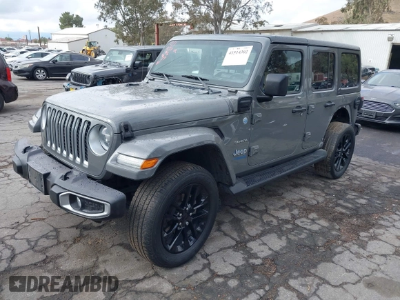 2021 Jeep Wrangler Unlimited Sahara with VIN 1C4JJXP64MW720263, listed as a IAAI auction lot 41514302 with 73,300 mi miles and . Bid and sale history available at DreamBid. Image 2.