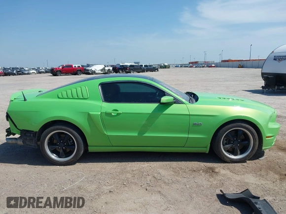2013 Ford Mustang GT with VIN 1ZVBP8CF9D5261944, listed as a IAAI auction lot 42248010 with 96,633 mi miles and . Bid and sale history available at DreamBid. Image 14.