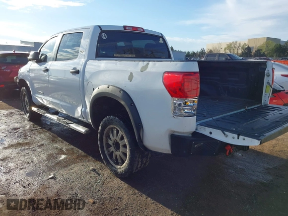 2012 Toyota Tundra 4WD Truck with VIN 5TFDW5F10CX241968, listed as a IAAI auction lot 41858300 with 272,634 mi miles. Bid and sale history available at carsss.com. Image 3.