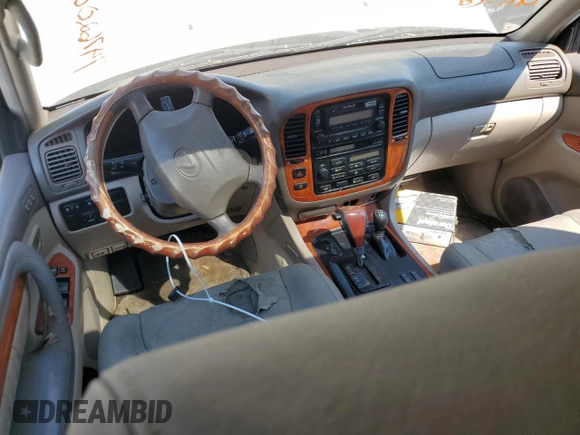 2000 Lexus LX 470 with VIN JT6HT00W2Y0106774, listed as a Copart auction lot 74762004 with Not Provided miles and Salvage Title. Bid and sale history available at DreamBid. Image 8.