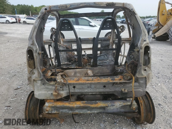 2015 Smart fortwo Passion z VIN WMEEJ3BA7FK794570, wystawiony jako Copart lot #67058864 z przebiegiem Nie podano mil oraz Nie do naprawy. Historia ofert i sprzedaży dostępna na DreamBid. Obrazek 10.