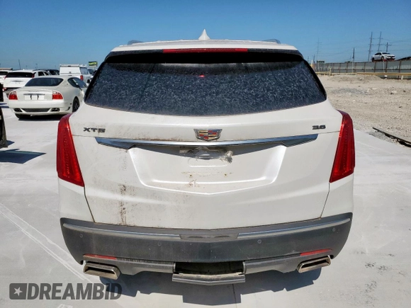 2017 Cadillac XT5 Luxury FWD with VIN 1GYKNBRS9HZ267858, listed as a Copart auction lot 58360695 with Not provided miles and Clean title. Bid and sale history available at DreamBid. Image 6.