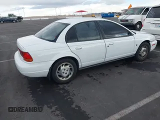 1997 Saturn SL with VIN 1G8ZK5275VZ254745, listed as a IAAI auction lot 41686816 with 135,074 mi miles and . Bid and sale history available at DreamBid. Image 4.