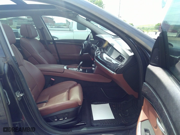 2012 BMW 5 Series Gran Turismo 550i xDrive with VIN WBASP4C53CC341928, listed as a IAAI auction lot 36580839 with 93,808 mi miles. Bid and sale history available at carsss.com. Image 5.