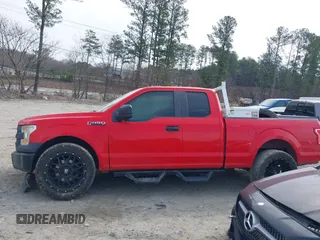 2015 Ford F-150 XL with VIN 1FTEX1CF4FFB01314, listed as a IAAI auction lot 41793296 with 141,347 mi miles. Bid and sale history available at carsss.com. Image 14.