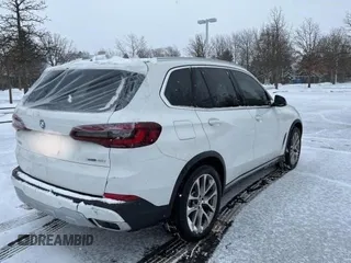 2021 BMW X5 xDrive40i with VIN 5UXCR6C03M9G52955, listed as a Copart auction lot 41009913 with 7,476 mi miles. Bid and sale history available at carsss.com. Image 4.