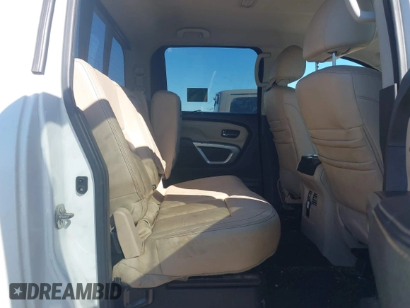 2016 Nissan Titan SL z VIN 1N6BA1F21GN504118, wystawiony jako IAAI lot #41729710 z przebiegiem 127 760 mil mil oraz . Historia ofert i sprzedaży dostępna na DreamBid. Obrazek 8.
