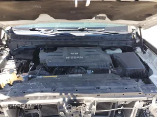 2017 Nissan Titan SV z VIN 1N6AA1EJ0HN569810, wystawiony jako Copart lot #48726215 z przebiegiem 126 458 mil mil oraz Szkoda całkowita • Salvage title. Historia ofert i sprzedaży dostępna na DreamBid. Obrazek 11.
