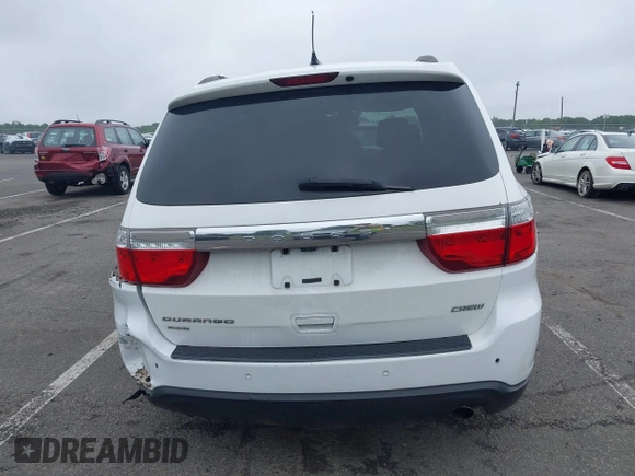 2013 Dodge Durango Crew with VIN 1C4RDJDG4DC518156, listed as a IAAI auction lot 42516880 with 162,402 mi miles and . Bid and sale history available at DreamBid. Image 16.