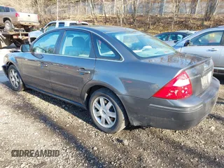 2005 Ford Five Hundred SE z VIN 1FAFP231X5G145153, wystawiony jako IAAI lot #42059747 z przebiegiem 59 114 mil mil oraz . Historia ofert i sprzedaży dostępna na DreamBid. Obrazek 3.