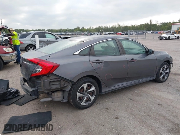2019 Honda Civic Sedan LX with VIN 19XFC2F66KE024399, listed as a IAAI auction lot 42023498 with 50,173 mi miles. Bid and sale history available at carsss.com. Image 4.