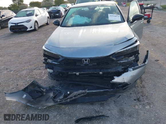 2025 Honda Civic Sport z VIN 2HGFE2F57SH519010, wystawiony jako IAAI lot #41934874 z przebiegiem 7999 mil mil oraz . Historia ofert i sprzedaży dostępna na DreamBid. Obrazek 6.