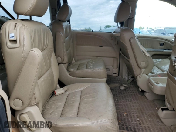2010 Honda Odyssey Touring with VIN 5FNRL3H94AB056657, listed as a Copart auction lot 72658934 with 202,690 mi miles and Salvage title. Bid and sale history available at DreamBid. Image 11.