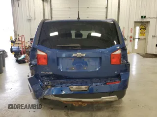 2014 Chevrolet Orlando z VIN KL77P2EK9EK542495, wystawiony jako Copart lot #71786924 z przebiegiem 210 349 mil mil oraz Szkody całkowita. Historia ofert i sprzedaży dostępna na DreamBid. Obrazek 6.