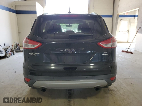 2015 Ford Escape SE with VIN 1FMCU9G95FUA49489, listed as a Copart auction lot 52891375 with 171,509 mi miles and Clean Title. Bid and sale history available at carsss.com. Image 6.