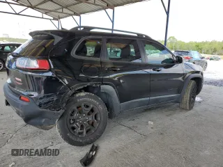 2019 Jeep Cherokee Trailhawk with VIN 1C4PJMBN7KD374676, listed as a Copart auction lot 51504125 with 34,323 mi miles and Salvage Title. Bid and sale history available at DreamBid. Image 3.