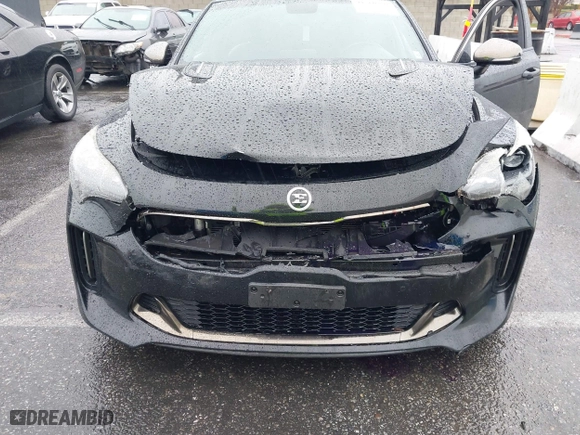 2018 Kia Stinger GT1 with VIN KNAE45LC4J6035780, listed as a IAAI auction lot 41560394 with 86,312 mi miles. Bid and sale history available at carsss.com. Image 6.