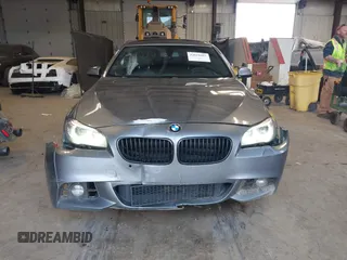 2014 BMW 5 Series 528i xDrive with VIN WBA5A7C5XED613856, listed as a IAAI auction lot 42018901 with 121,783 mi miles and . Bid and sale history available at DreamBid. Image 12.
