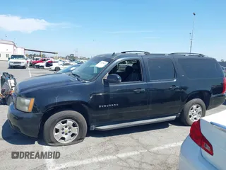 2011 Chevrolet Suburban LT with VIN 1GNSCJE0XBR285973, listed as a IAAI auction lot 42007844 with 252,994 mi miles. Bid and sale history available at carsss.com. Image 14.