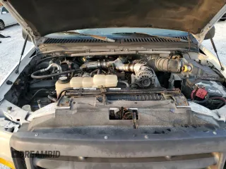 2000 Ford Super Duty F-250 XL with VIN 1FTNF21F7YEA97991, listed as a Copart auction lot 54577544 with 82,036 mi miles and Salvage Title. Bid and sale history available at carsss.com. Image 12.