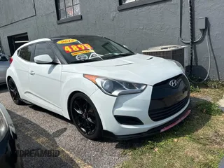 2012 Hyundai Veloster w/Gray Int с VIN KMHTC6AD6CU036826, выставлен на аукционе Copart как лот 48781135 с пробегом 169 498 миль миль и Чистый • Clean title. История ставок и продаж доступна на DreamBid. Изображение 1.