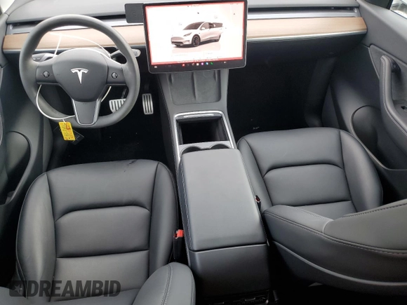 2022 Tesla Model Y Performance with VIN 7SAYGDEF1NF445085, listed as a Copart auction lot 58809495 with 14,832 mi miles and Salvage title. Bid and sale history available at DreamBid. Image 8.