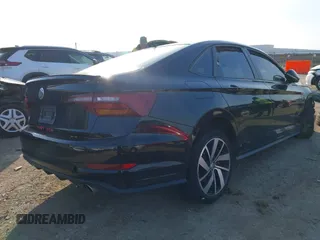 2019 Volkswagen Jetta GLI S z VIN 3VW5T7BU3KM245927, wystawiony jako IAAI lot #41573257 z przebiegiem 57 322 mil mil oraz . Historia ofert i sprzedaży dostępna na DreamBid. Obrazek 4.