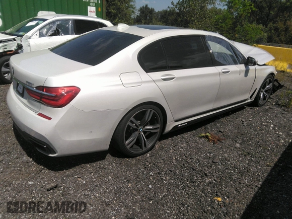 2017 BMW 7 Series 750i with VIN WBA7F0C35HGM21649, listed as a IAAI auction lot 37362691 with 10,000 mi miles and . Bid and sale history available at DreamBid. Image 4.