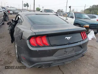 2018 Ford Mustang EcoBoost with VIN 1FA6P8TH3J5146392, listed as a IAAI auction lot 41780815 with 70,992 mi miles and . Bid and sale history available at carsss.com. Image 3.