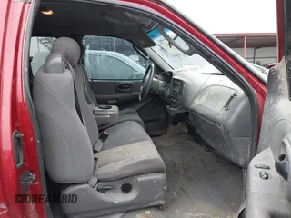 2003 Ford F-150 XL with VIN 2FTPX18LX3CA89961, listed as a IAAI auction lot 41901357 with 199,708 mi miles. Bid and sale history available at carsss.com. Image 5.