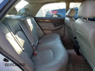 2004 Hyundai XG with VIN KMHFU45EX4A281391, listed as a Copart auction lot 83409284 with 177,666 mi miles and Salvage Title. Bid and sale history available at carsss.com. Image 10.