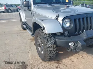 2018 Jeep Wrangler Unlimited Sport S with VIN 1C4BJWDG5JL827850, listed as a IAAI auction lot 39621196 with 93,231 mi miles and . Bid and sale history available at DreamBid. Image 6.