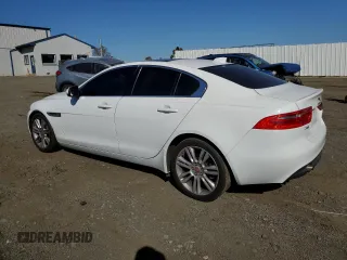 2019 Jaguar XE 25t with VIN SAJAR4FX8KCP52067, listed as a Copart auction lot 76584654 with 82,069 mi miles and Salvage Title. Bid and sale history available at carsss.com. Image 2.