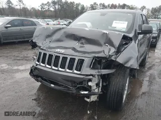 2016 Jeep Grand Cherokee Laredo with VIN 1C4RJFAG0GC325114, listed as a IAAI auction lot 40878955 with 277,225 mi miles. Bid and sale history available at carsss.com. Image 6.