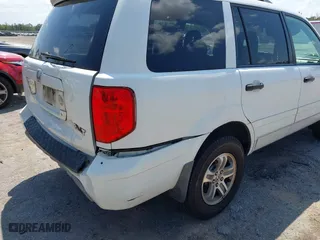 2004 Honda Pilot EX with VIN 2HKYF18664H550277, listed as a IAAI auction lot 41966015 with 285,700 mi miles. Bid and sale history available at carsss.com. Image 12.