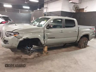 2023 Toyota Tacoma 4WD SR with VIN 3TMCZ5ANXPM607489, listed as a IAAI auction lot 41605018 with 15,229 mi miles. Bid and sale history available at carsss.com. Image 14.