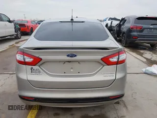 2016 Ford Fusion Titanium Hybrid with VIN 3FA6P0RU9GR143203, listed as a IAAI auction lot 41332144 with 94,357 mi miles. Bid and sale history available at carsss.com. Image 17.