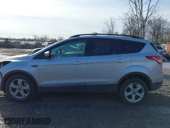 2013 Ford Escape SE with VIN 1FMCU9G98DUD51808, listed as a IAAI auction lot 41527022 with 141,471 mi miles. Bid and sale history available at carsss.com. Image 14.