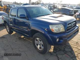 2006 Toyota Tacoma PreRunner z VIN 3TMJU62N46M021976, wystawiony jako IAAI lot #41427392 z przebiegiem 245 519 mil mil oraz . Historia ofert i sprzedaży dostępna na DreamBid. Obrazek 1.